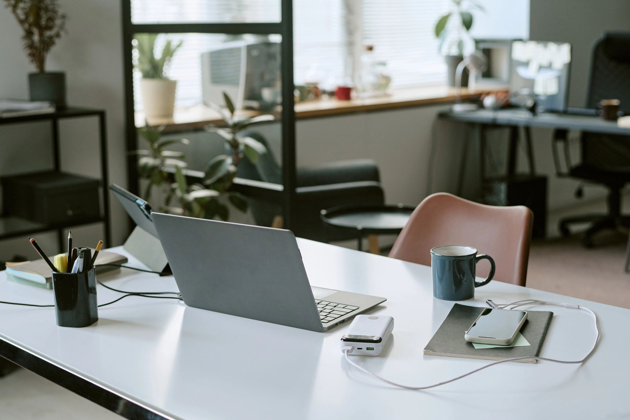 Modern workspace with laptop and planning tools